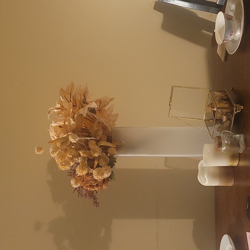 Beautiful fall floral arrangement with frosted glass vase